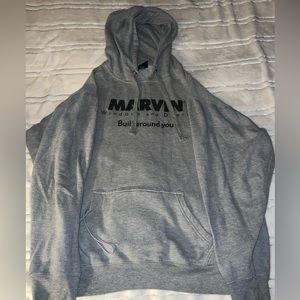 Gray, hooded sweatshirt with pocket and cup holder